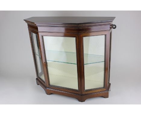 A mahogany table top display cabinet with single glazed door opening onto a glass shelf, on bracket feet, 48cm by 42cm