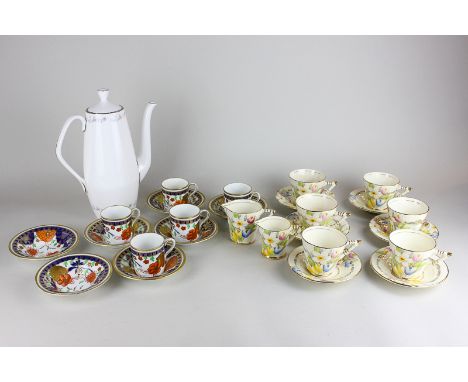 A set of six Phoenix ware Bouquet pattern tea cups and saucers with two jugs, a set of five Shelley coffee cans and seven sau