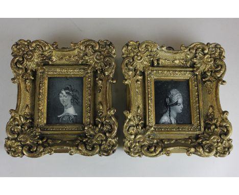 A pair of 19th century grey and white portrait miniatures of young women in gilt frames (a/f), 6cm by 8cm