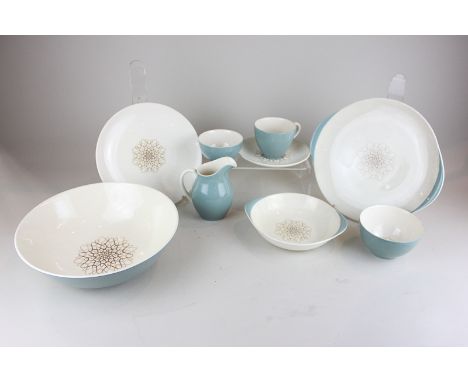 A Royal Doulton Desert Star part dinner and tea service including a large bowl, cake plate, eight dinner plates, etc