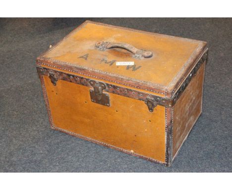 A Louis Vuitton leather trunk monogrammed AMW, bearing Louis Vuitton label numbered 761223, 57.5cm wide