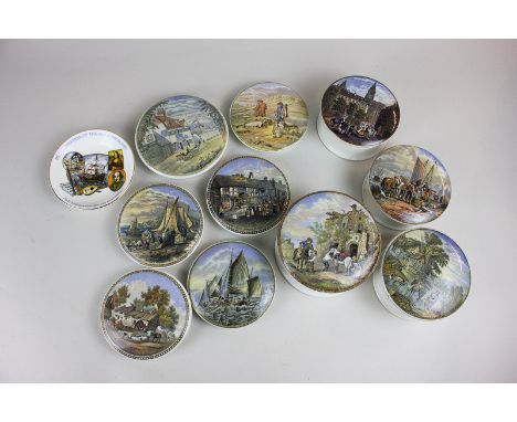 Ten various ceramic pot lids, four with pots, depicting nautical, countryside and village scenes, together with a Millennium 