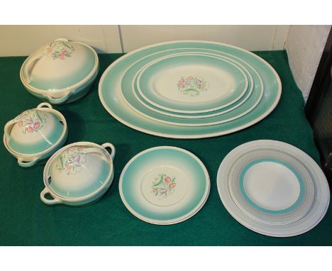 A Susie Cooper part dinner service, Dresden spray pattern with turquoise border, to include four graduated oval platters, a t