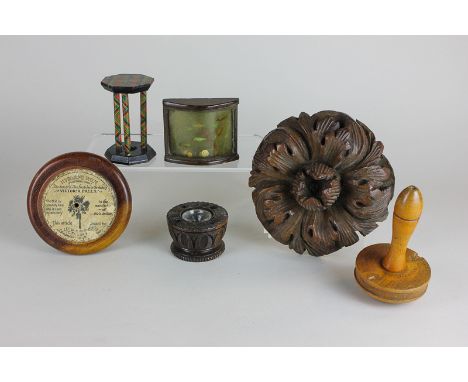 A carved wood foliate boss, an inkwell, embroider's tool, small dish, tartan ware item and small curved panel depicting a vie