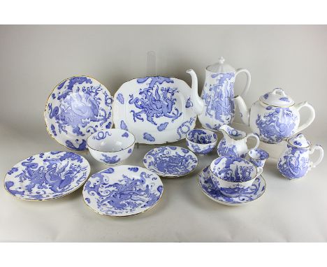 A Royal Worcester blue Dragon porcelain part tea and coffee set including teapot, coffee pot (matched lid"), seven cups, sauc