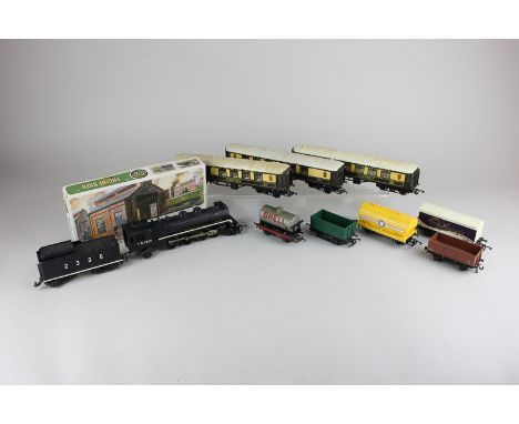 A 00 gauge American style locomotive and tender, TR 2335, together with three Pullman carriages, a boxed Airfix engine shed a