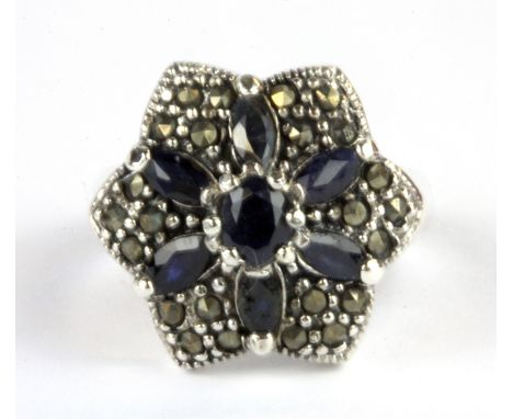 A 925 silver and marcasite sapphire set cluster ring, (N).