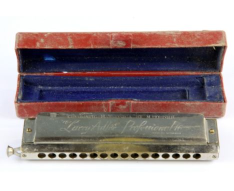 A boxed vintage M. Hohner, Larry Adler chromatic harmonica, W. 8cm.