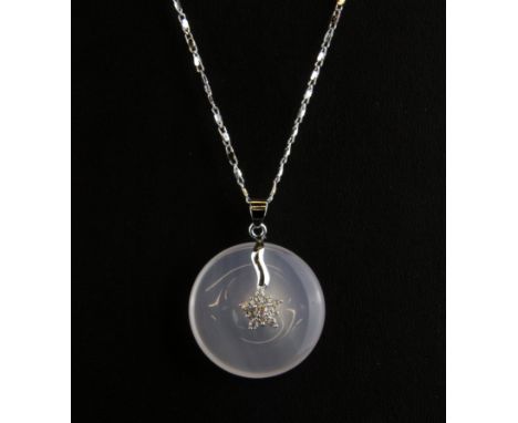 An 18ct white gold plated chain, together with a white jade disk pendant set with white stones, disk Dia. 3cm.
