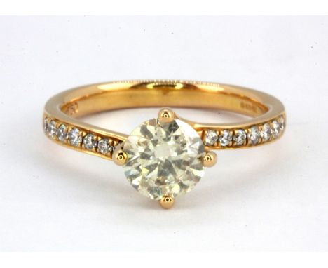 An 18ct rose gold solitaire ring set with a 1ct brilliant cut diamond and diamond set shoulders, (L),