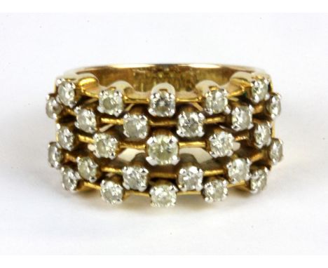 A yellow metal (tested 18ct gold) diamond set ring, W. 7.9g (M).