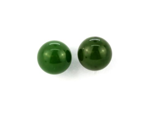 A pair of 9ct yellow gold jade set stud earrings, Dia. 0.9cm.