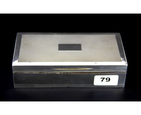 A Mappin &amp; Webb hallmarked silver cigarette box, size 18 x 5 x 9cm.