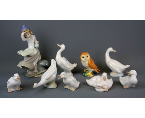 A Nao girl figurine, a quantity of Nao ducks and a Beswick owl figure, tallest 25cm.