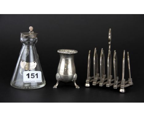 A hallmarked silver expanding toast rack, silver topped jug and a Mappin &amp; Webb silver pot, tallest 12cm.