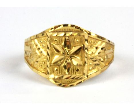 A 22ct yellow gold (stamped 22ct) ring, W. 4.3g (O).