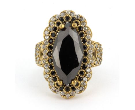 A 925 silver gilt ring set with black and white stones, (P.5).