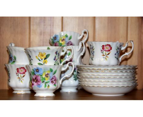 A quantity of Royal Albert cups and saucers.