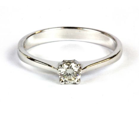 An 18ct white gold (stamped 750) diamond solitaire ring. Approx. 0.25ct estimated VS (M), W. 2.2g.