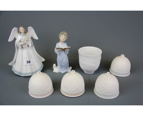 A Lladro figure of an angel playing a lute, Lladro figure of a singing cherub, four Lladro collector's bells in boxes and a f