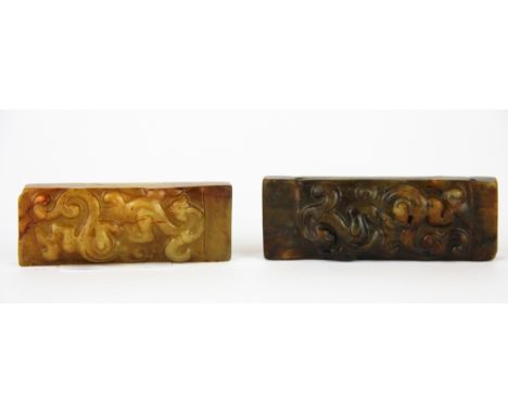 Two Chinese carved stone scroll weights, H. 7cm 8cm.