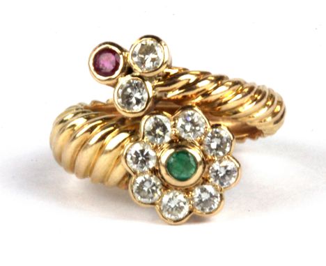 A yellow metal (tested minimum 18ct gold) ring set with diamonds, emeralds and rubies, W. 3.9g (F).