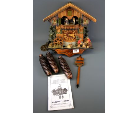 A German Black Forest cuckoo clock, size 33 x 30cm.
