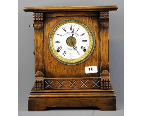 A 1912 Fattorini &amp; Sons oak mantle clock, H. 32cm.