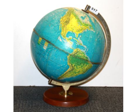 A vintage globe, H. 40cm.