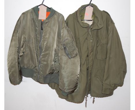 An American army fatigue jacket, together with a bomber jacket.