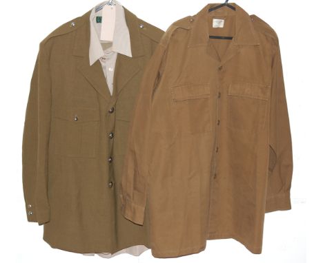 A South African army number one dress uniform comprising of shirt, tie tunic and trousers, together with various field dress 