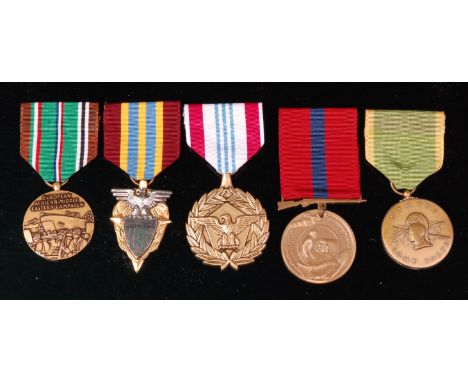 A group of American medals to include European-African-Middle eastern campaign, Meritorious Civilian Service, Defense Meritor