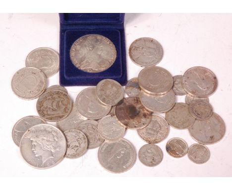 Mixed lot of various silver coins to include; 1923 'Peace' dollar, Maria Theresa Thaler, Switzerland 5 francs, 1 francs, Port