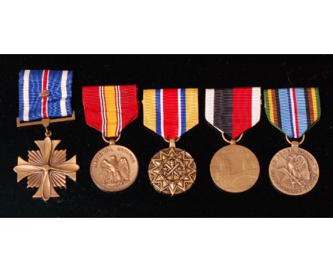 A group of American medals to include Distinguished Flying Cross, Army National Guard For Achievement, National Defense, Army