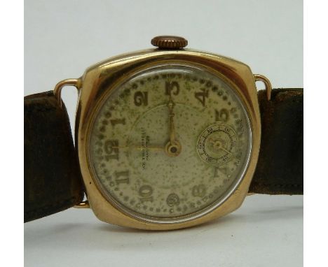 A gentleman's 9ct gold Cyma cushion shaped manual wind wristwatch, 30mm diameter, circa 1940's working