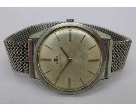 A gentleman's stainless steel Jaeger LeCoultre slim cased manual wind wristwatch, calibre K818 | c, 34mm diameter, circa 1960
