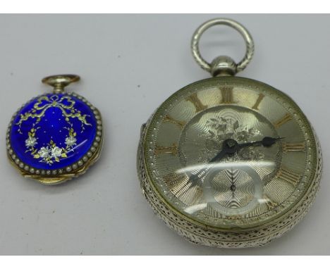 A silver open face pocket watch with fancy case, silver dial with raised gold Roman numerals and fusee movement. Together wit