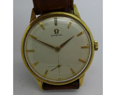 A gentleman's 14ct gold Omega manual wind wristwatch, calibre 268, 34mm diameter, circa 1960, working
