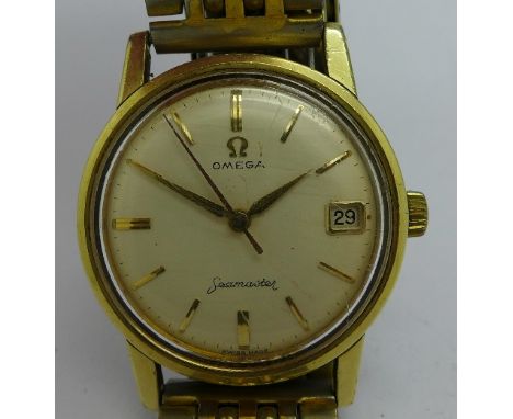 A gentleman's gold plated Omega Seamaster calendar manual wind wristwatch, calibre 610, 33.5mm diameter, circa 1960, working 