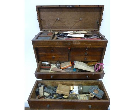 An engineer's tool box with engineering and watchmaker's tools, lathe parts, etc. 