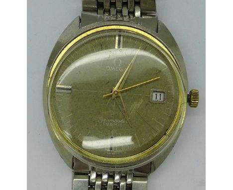 A gentleman's stainless steel Omega Seamaster Cosmic calendar manual wind wristwatch, 35mm diameter, working. Stem faulty. 