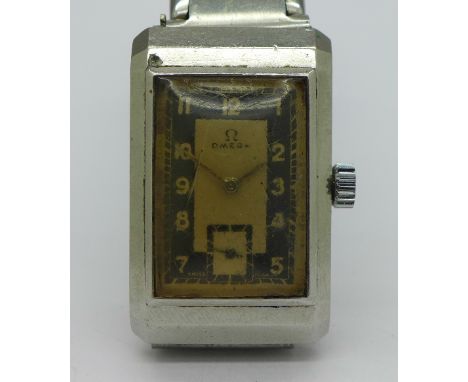 A gentleman's Omega tank style manual wind wristwatch, Staybrite case, 21.5mm diameter, circa 1940's, working. 