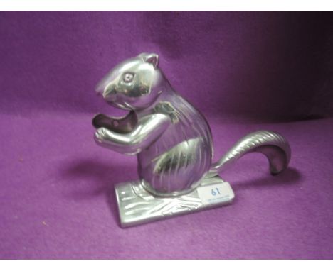 A vintage cast aluminium squirrel nutcracker.