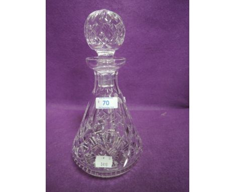 A Waterford crystal decanter.