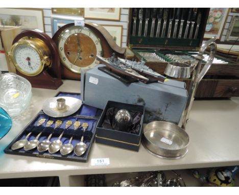 An interesting plated bottle holder, a set of HMY Britannia cufflinks a set of spoons,a candlestick holder and two model ship