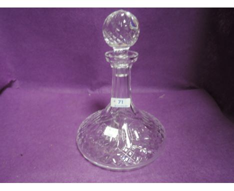A Waterford crystal decanter.