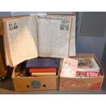 Zwei Bananenkartons mit Büchern