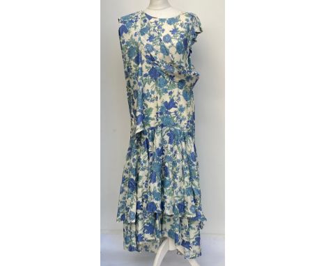 A vintage Droopy & Brown by Angela Holmes silk dress, blue rose design, size 10Provenance: from the wardrobe of The Late Duch