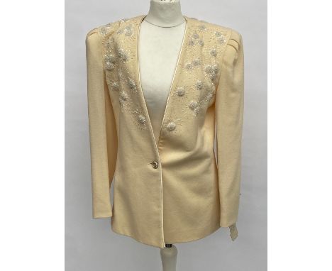 A vintage Nolan Miller beaded wool jacket with matching skirt, US size 6