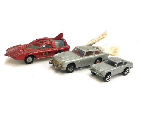 A Dinky Spectrum Patrol car together with a Corgi James Bond 007 Aston Martin DB5 with 2 figures and secret instructions and 